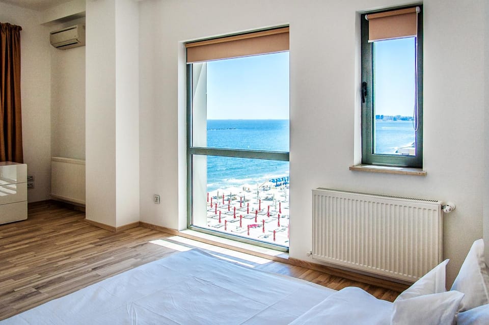 Bed, Natural landscape, View (from property/room), Bedroom, Sea view, air conditioner