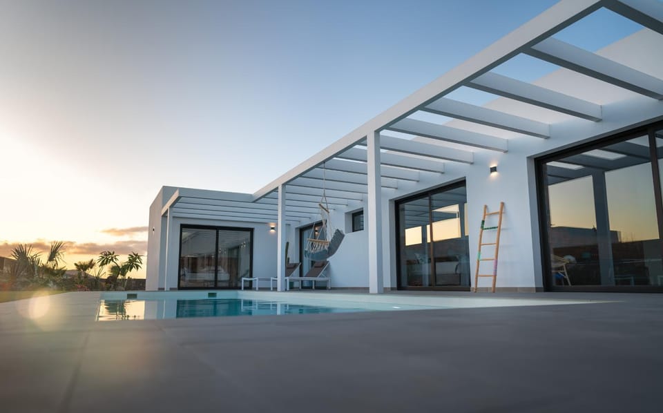 Property building, Patio, Garden, Swimming pool, Sunset