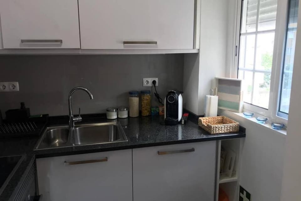 Kitchen or kitchenette, stove