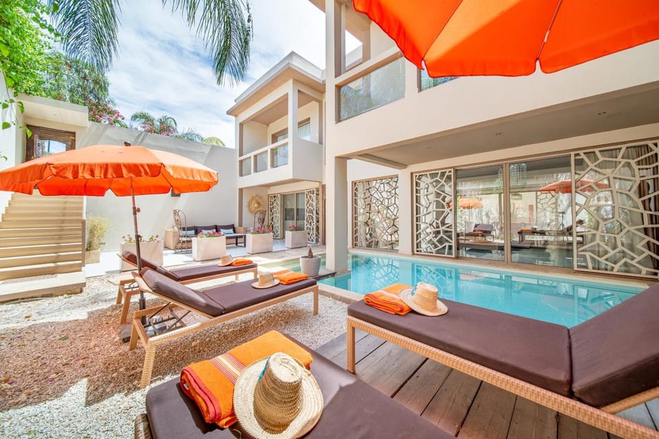 Property building, Patio, Day, Natural landscape, View (from property/room), Balcony/Terrace, Living room, Seating area, Pool view, Swimming pool, sunbed