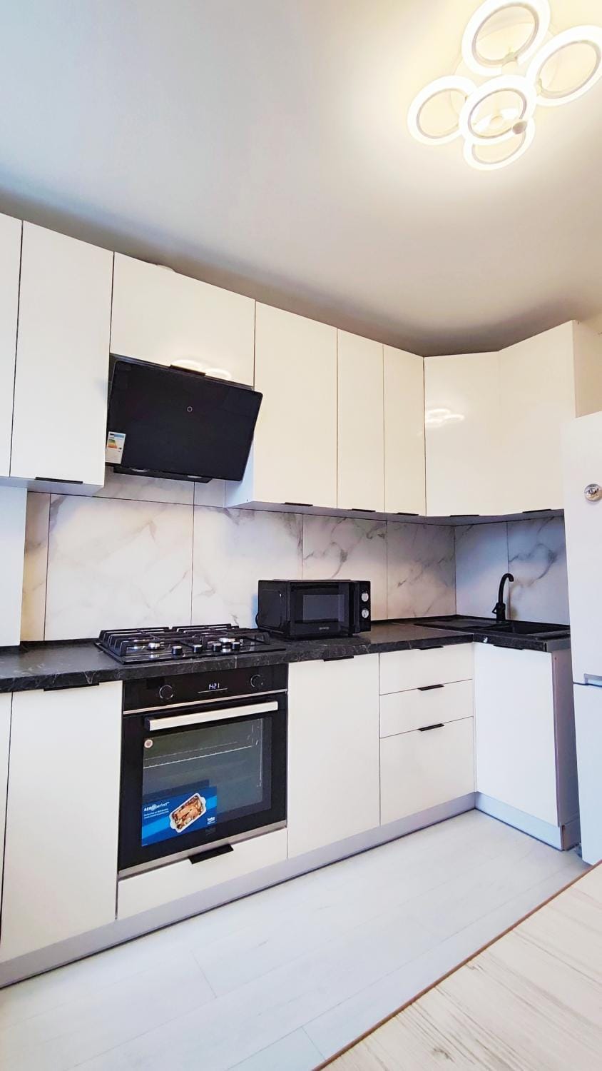 Kitchen or kitchenette, stove
