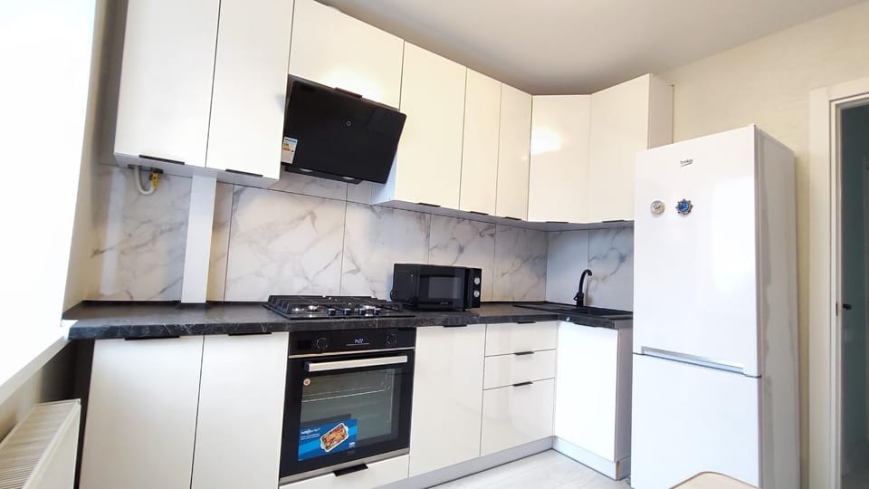 Kitchen or kitchenette, oven, stove