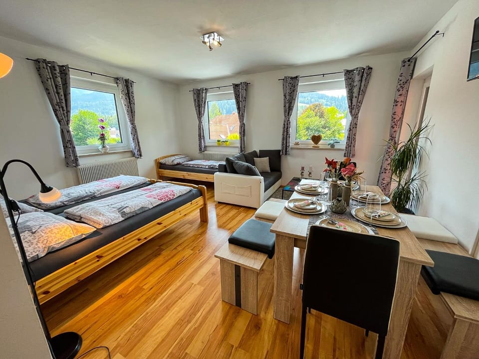 Bed, TV and multimedia, Living room, Photo of the whole room, Seating area, Dining area, Bedroom