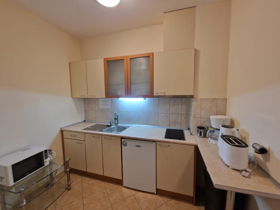 Kitchen or kitchenette, stove