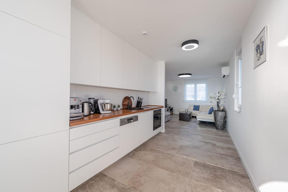 Bekina, stylish rooftop pool apartment House in Novalja