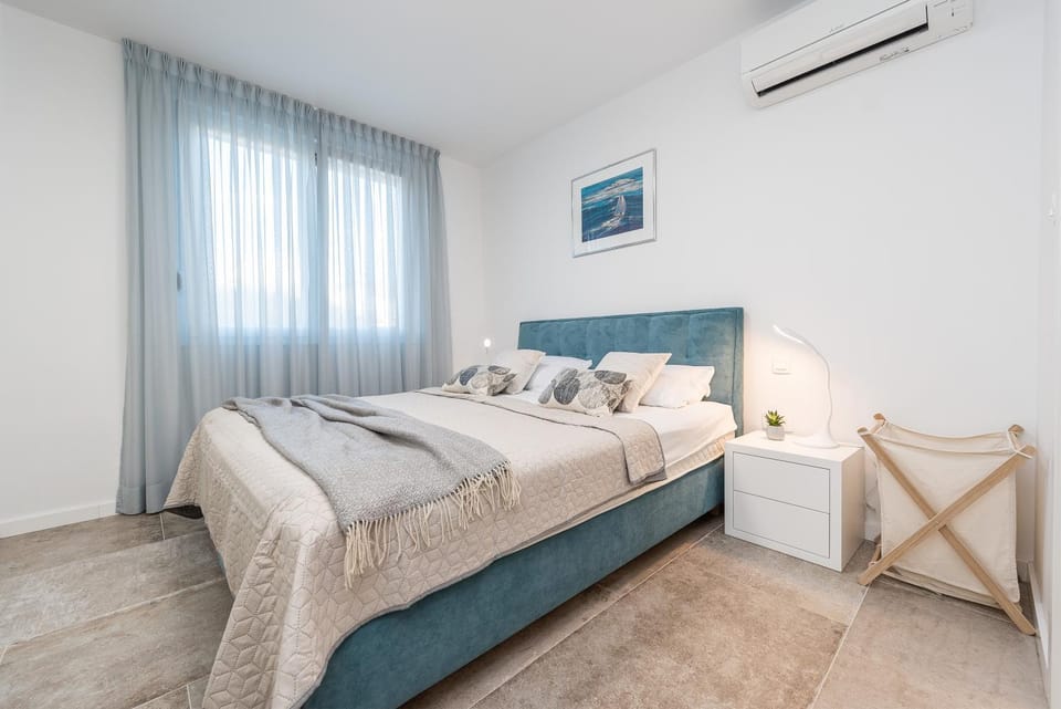 Bekina, stylish rooftop pool apartment House in Novalja