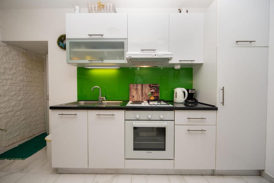Kitchen or kitchenette, stove