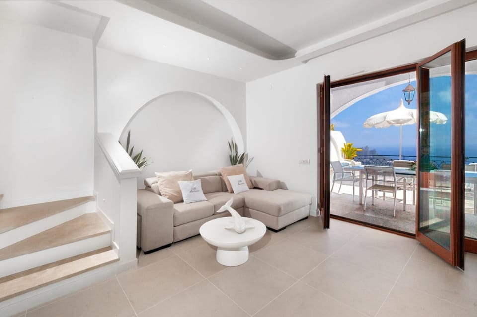 View (from property/room), Living room, Seating area, Sea view
