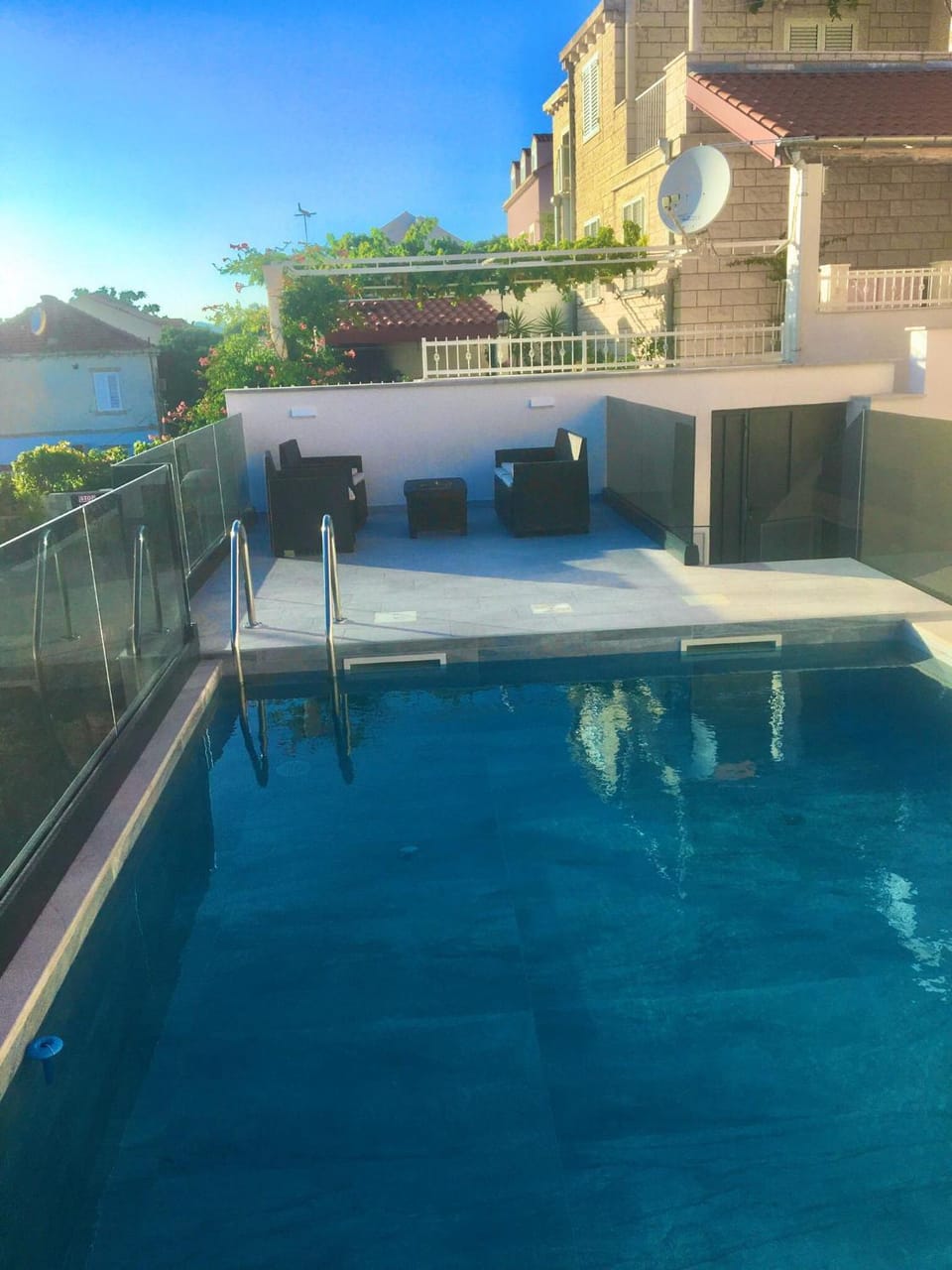 Patio, Fitness centre/facilities, Seating area, Swimming pool