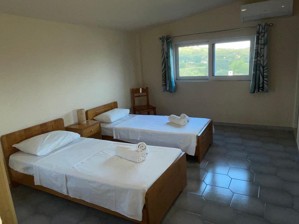 Bed, Photo of the whole room, Bedroom, towels, air conditioner
