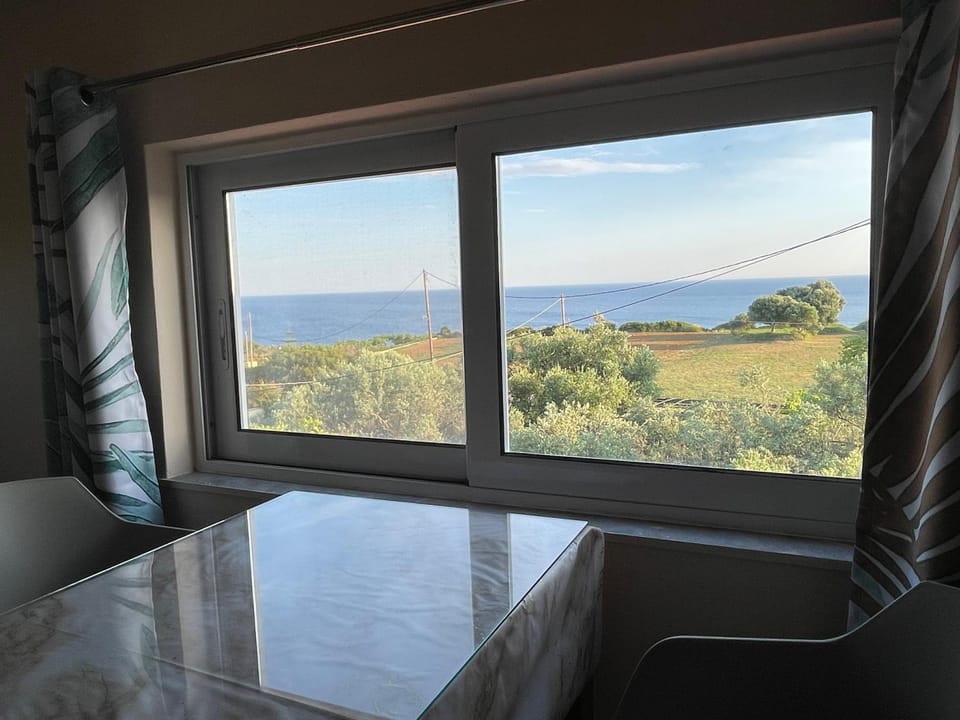 Natural landscape, Living room, Seating area, Sea view