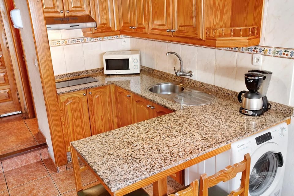 Apartamento económico con fibra rápida y terraza , ideal familias Montecarlo Apartamento10 Apartment in Puerto Rico de Gran Canaria