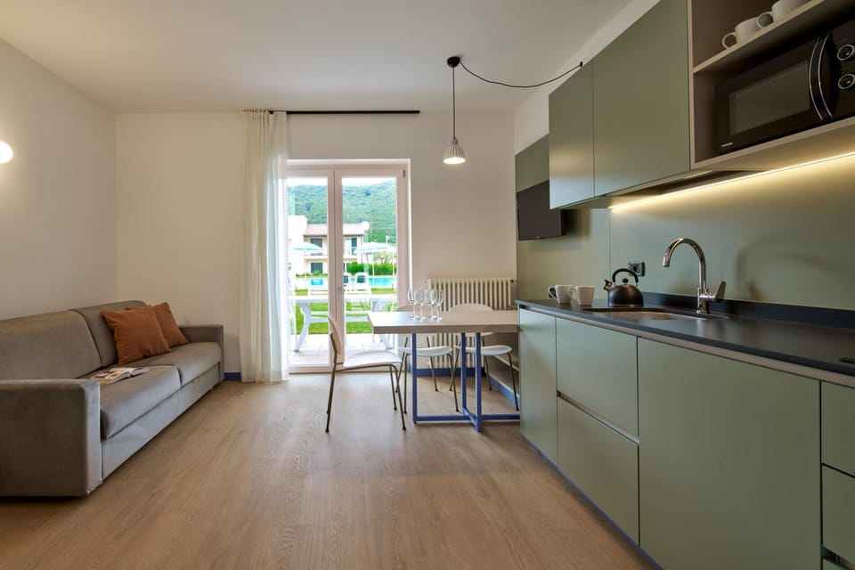 Kitchen or kitchenette, Living room, Dining area, stove