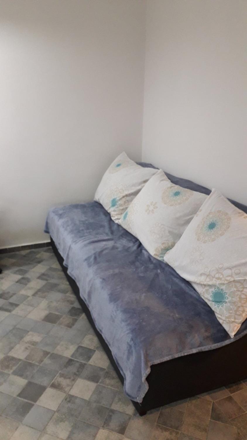 Bed, Seating area, Bedroom