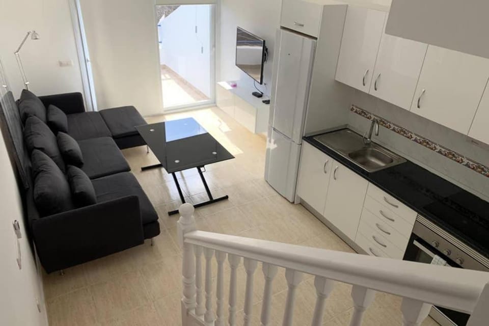 Kitchen or kitchenette, Living room, Seating area, Dining area