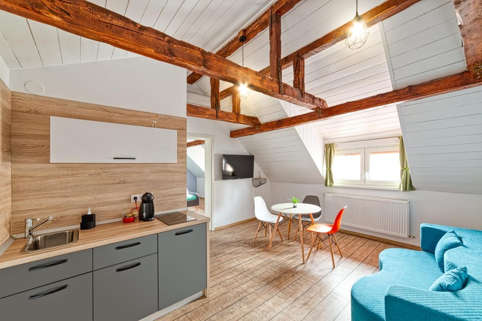 TV and multimedia, Coffee/tea facilities, Kitchen or kitchenette, Living room, Seating area, Dining area