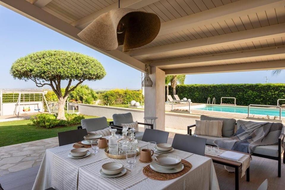 Patio, Day, Natural landscape, Garden, View (from property/room), Dining area, Garden view, Swimming pool, Continental breakfast