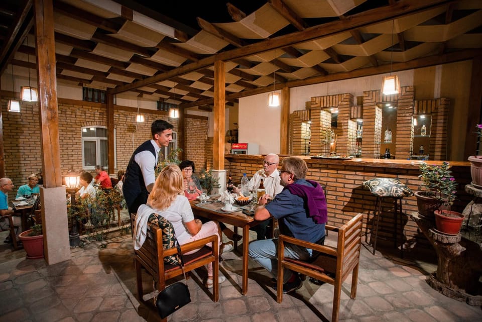 Restaurant/places to eat, People, Nightclub / DJ, Living room, Lounge or bar, Food and drinks, Banquet/Function facilities, Seating area, Food, Guests, Drinks, group of guests, Family