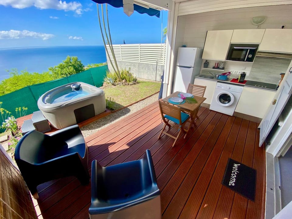 Patio, Day, Hot Tub, Hot Tub, View (from property/room), Balcony/Terrace, Kitchen or kitchenette, Seating area, Dining area, Sea view, oven, stove
