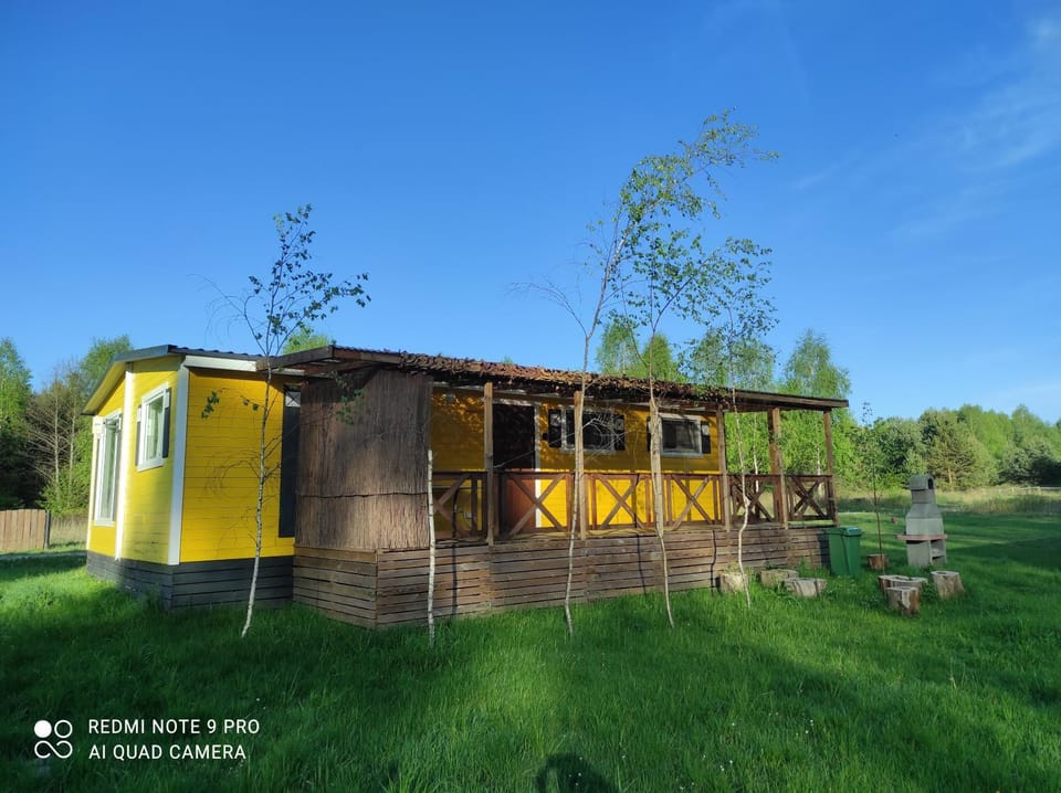 Domek letniskowy - żółty-całoroczny House in Pomeranian Voivodeship