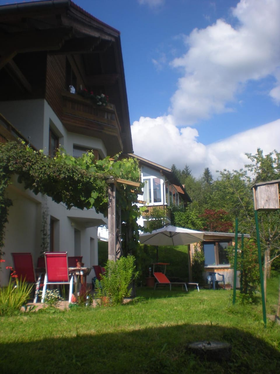 Facade/entrance, Summer, On site, Garden view