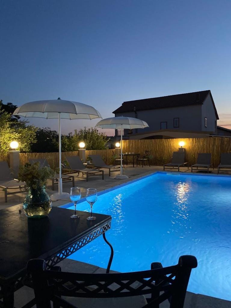 Night, Pool view, Swimming pool, sunbed