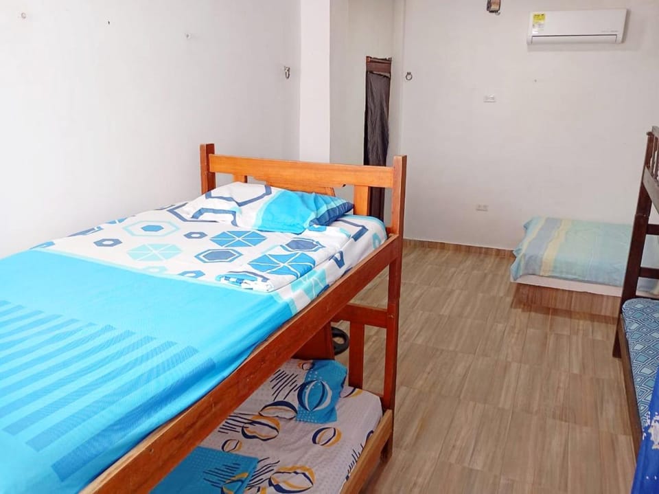 Photo of the whole room, bunk bed, air conditioner