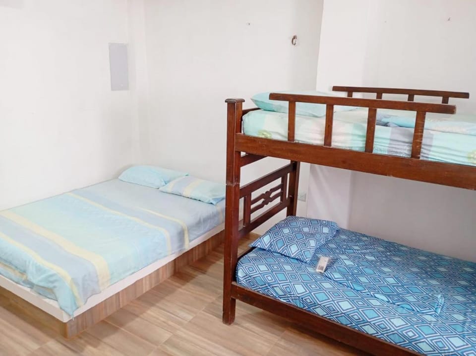 Photo of the whole room, bunk bed, air conditioner