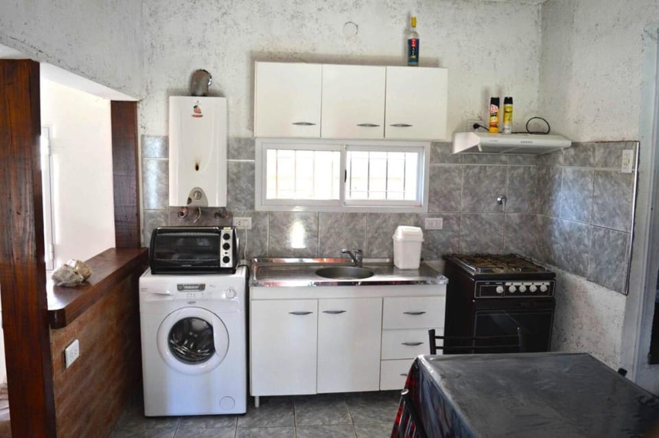 Kitchen or kitchenette, washing machine, washing machine