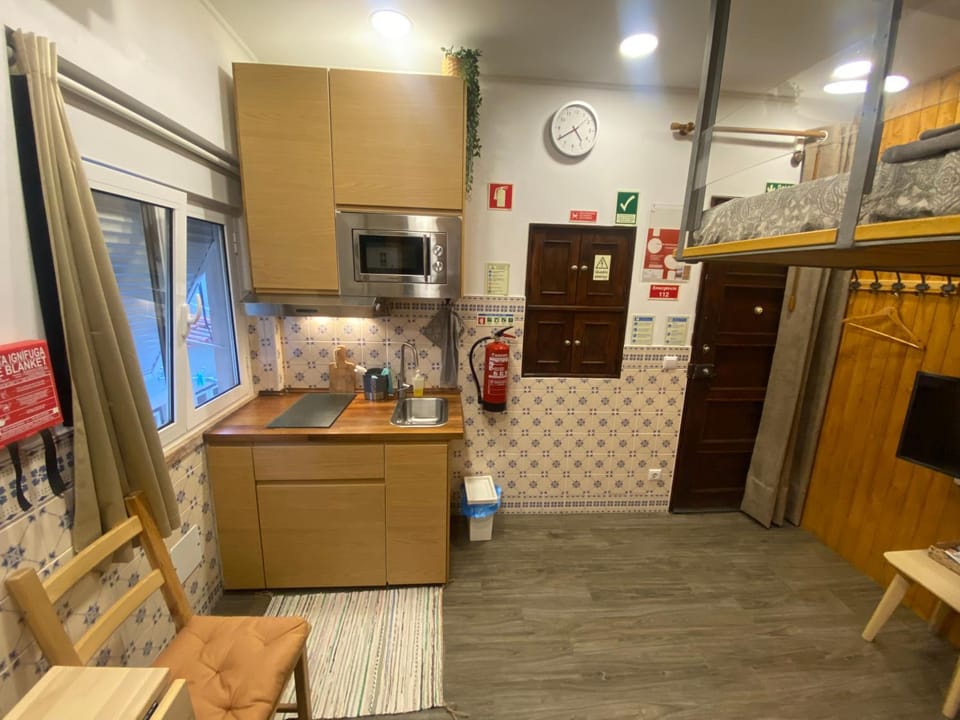 Kitchen or kitchenette, stove