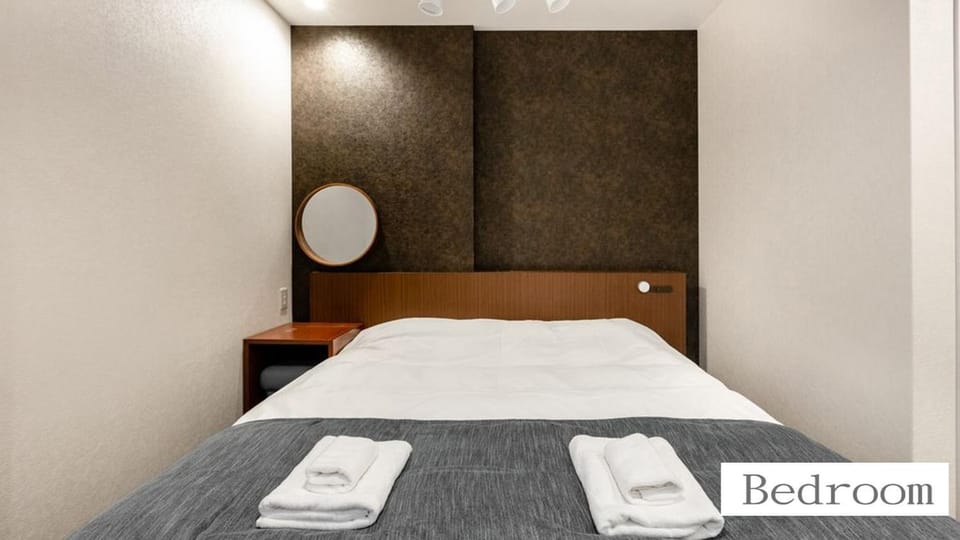 玉出サクラハウスダブルルームwifi付 玉出駅から徒歩2分 地下鉄難波迄8分 Apartment in Osaka
