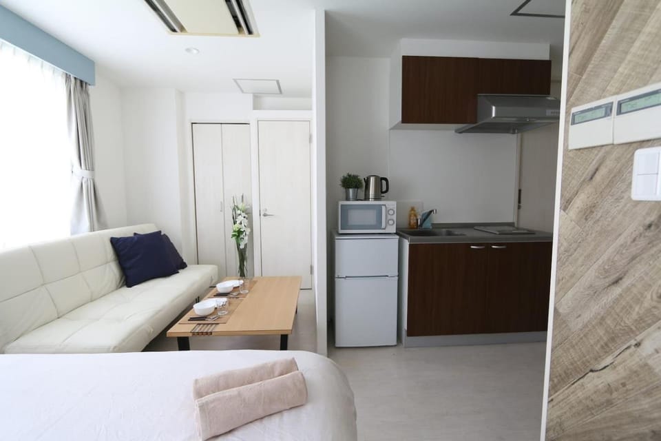 Kitchen or kitchenette, Living room, Photo of the whole room, Seating area, Dining area, microwave, stove, wardrobe