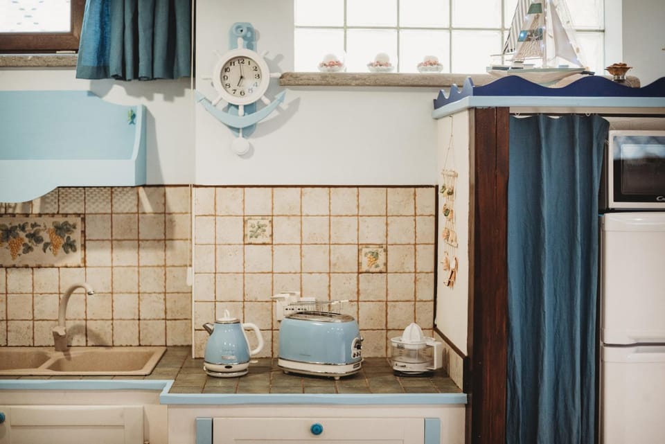 Kitchen or kitchenette, toaster