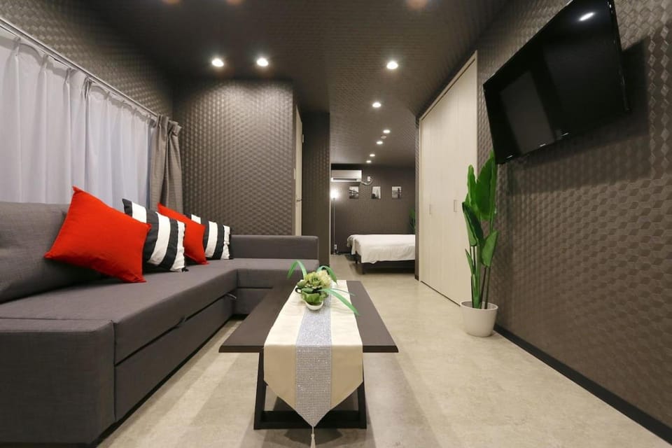 Bed, TV and multimedia, Living room, Photo of the whole room, Seating area, Bedroom