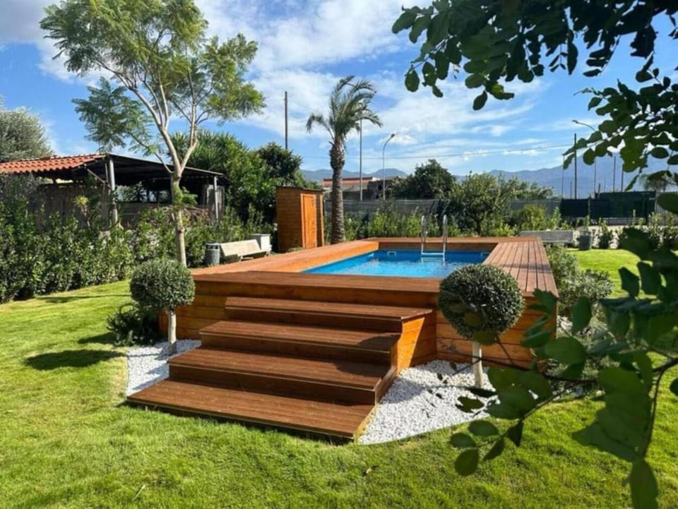 Property building, Day, Natural landscape, Garden, Garden view, Pool view, Swimming pool, Swimming pool, sunbed