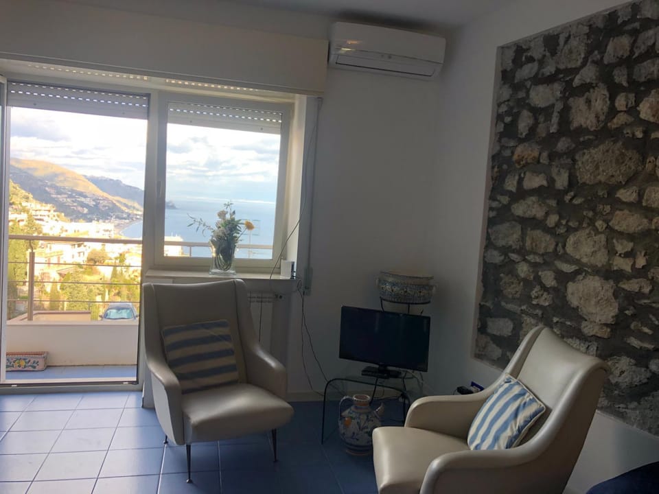 Living room, Seating area, Sea view