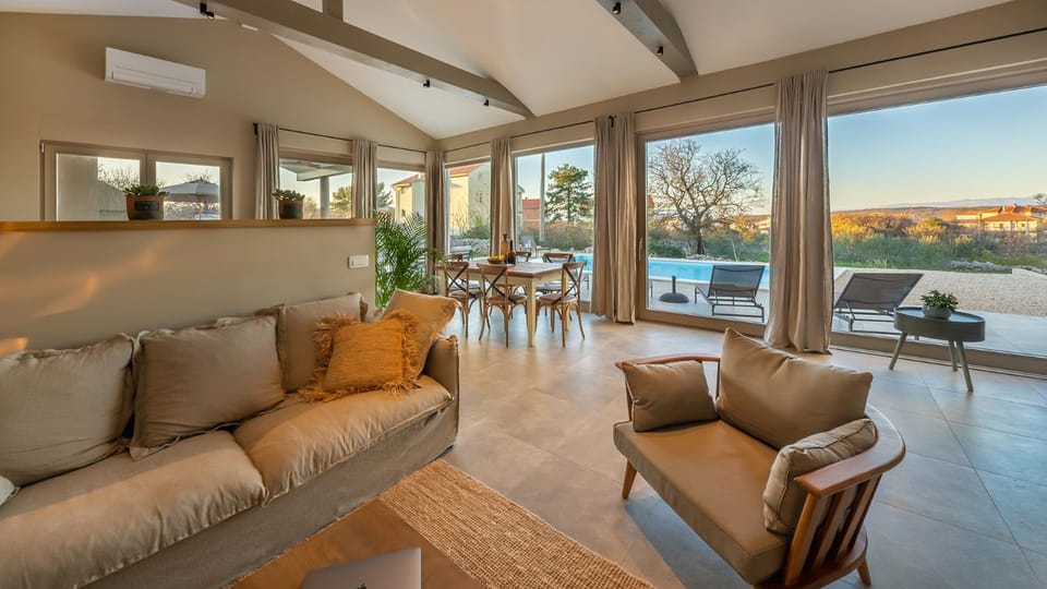 Living room, Seating area, Pool view