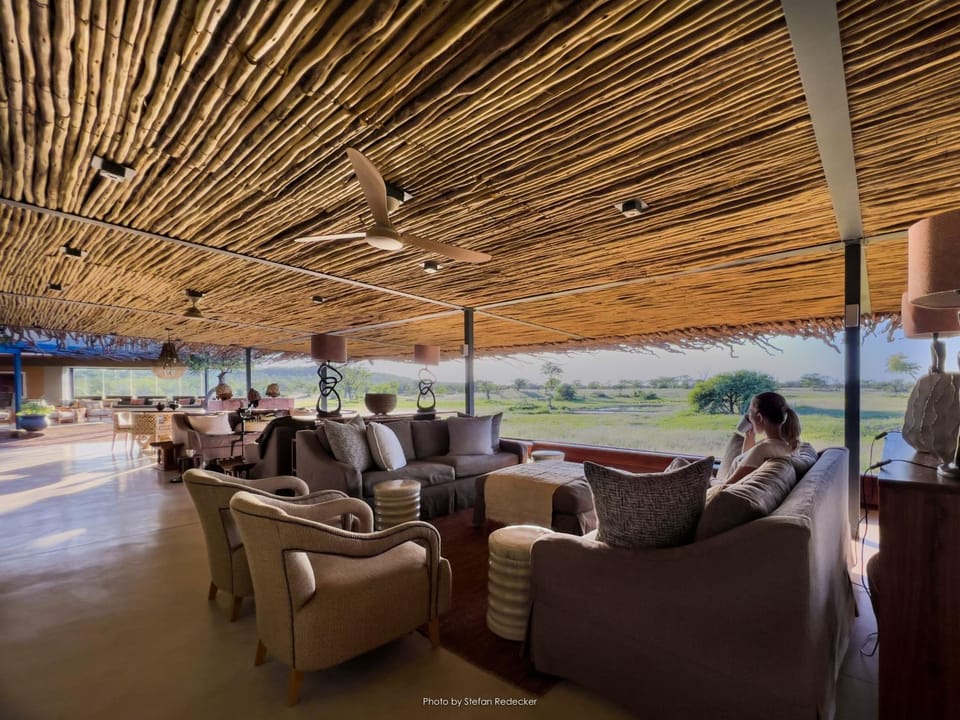 Property building, Communal lounge/ TV room, Day, People, Natural landscape, Summer, View (from property/room), Lounge or bar, Landmark view