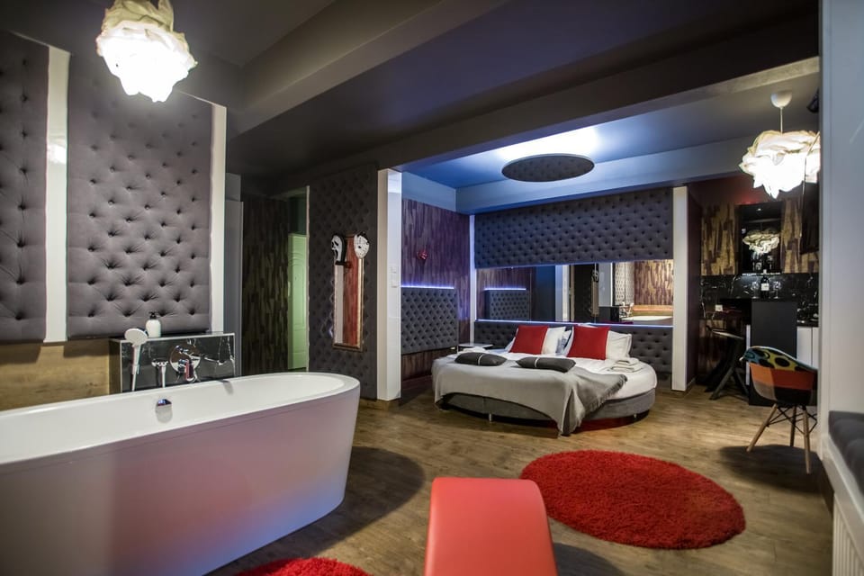 Bed, Bathroom, Seating area, Bedroom, Bath
