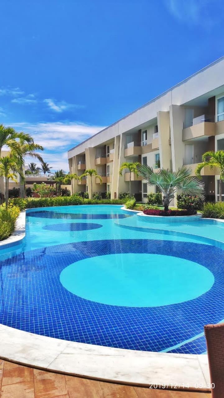 Guarajuba Porto Smeralda Village C02, térreo - GUARAJUBA TEMPORADA, viva mais de uma experiência de hospedagem conosco! 130m da praia House in State of Bahia