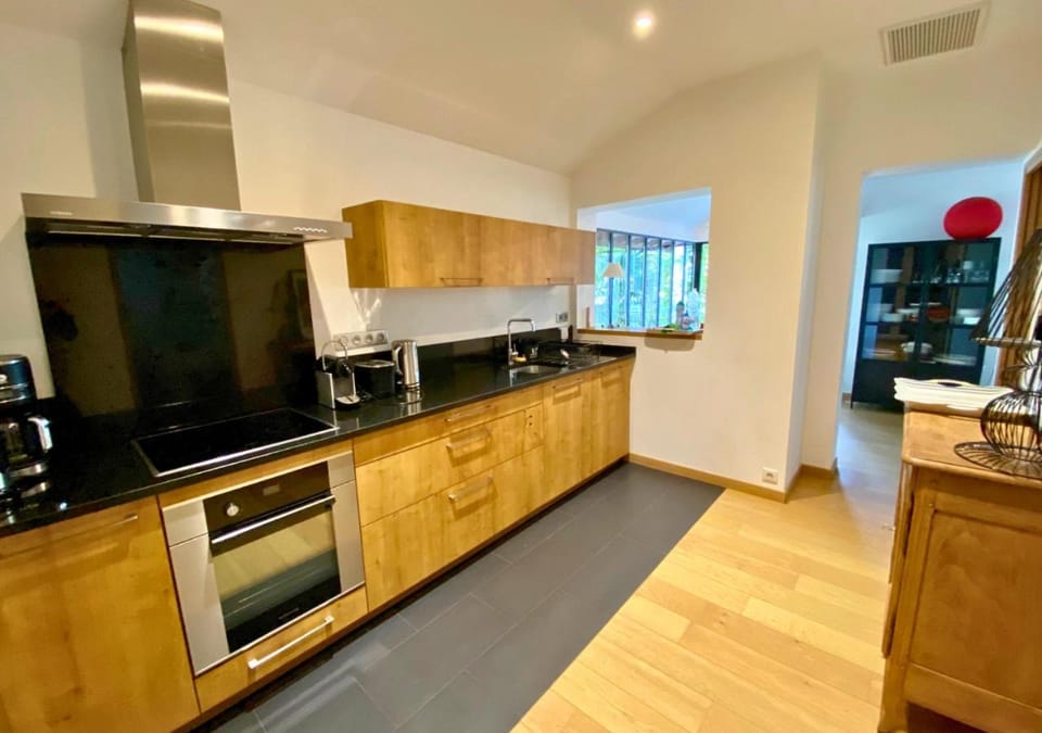 Kitchen or kitchenette, dishwasher, oven, stove, toaster