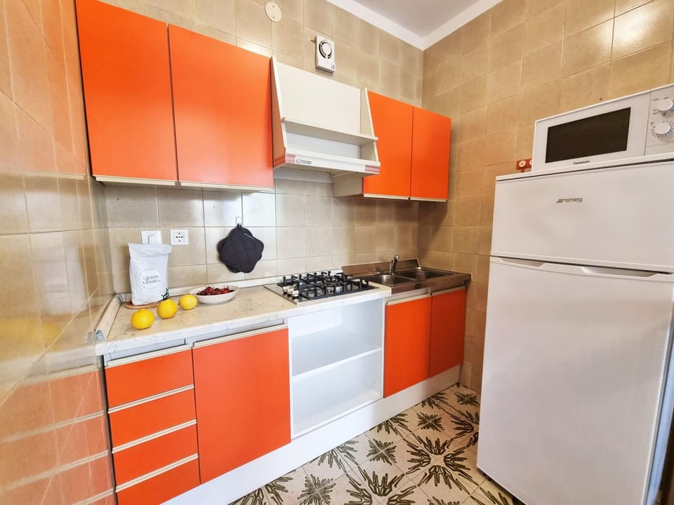 Kitchen or kitchenette, microwave