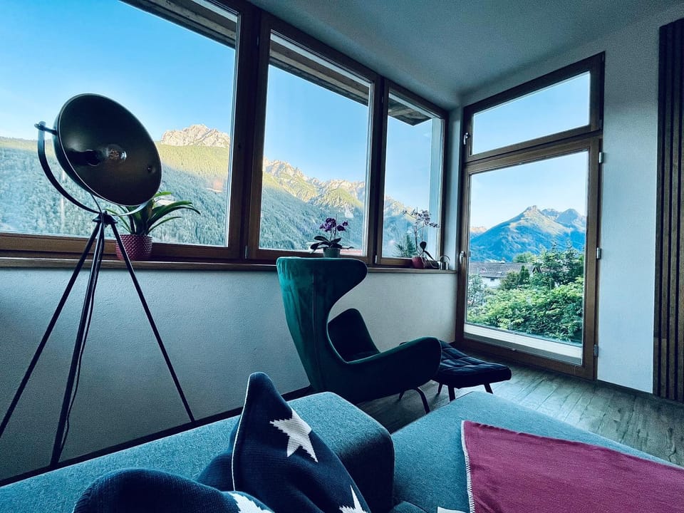 Natural landscape, Living room, Seating area, Mountain view
