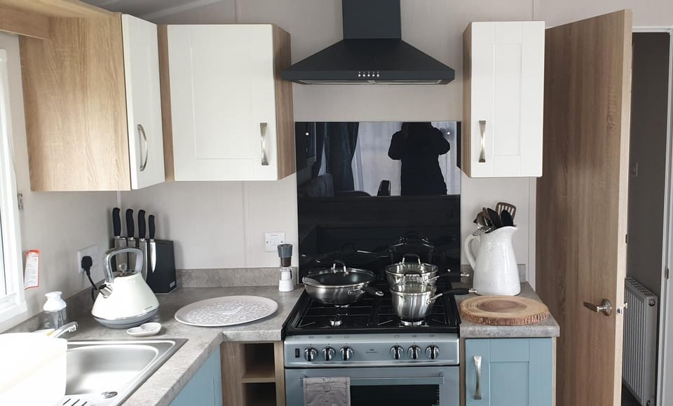 Kitchen or kitchenette, stove