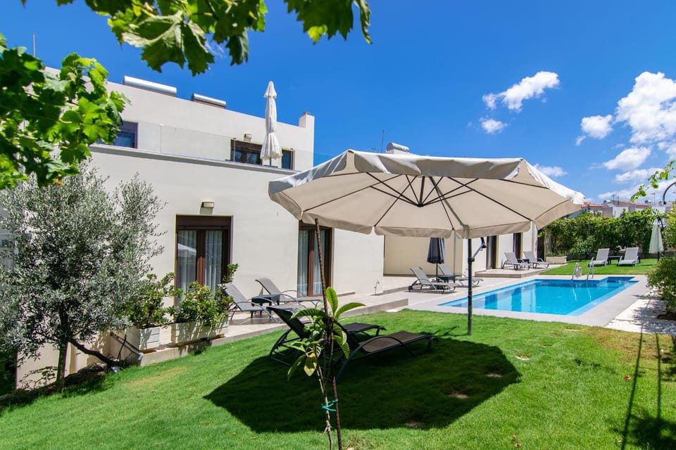Property building, Patio, Pool view, Swimming pool, sunbed