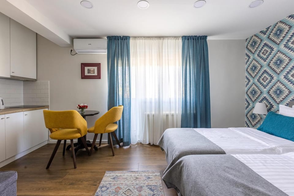 Bed, Seating area, Bedroom, hair dresser, air conditioner