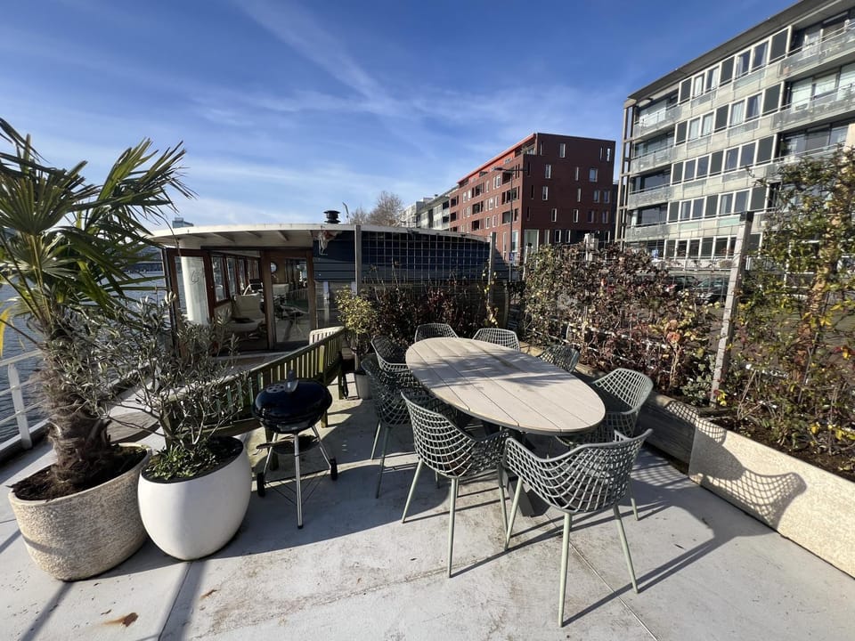 Stunning boat with a view Docked boat in Amsterdam