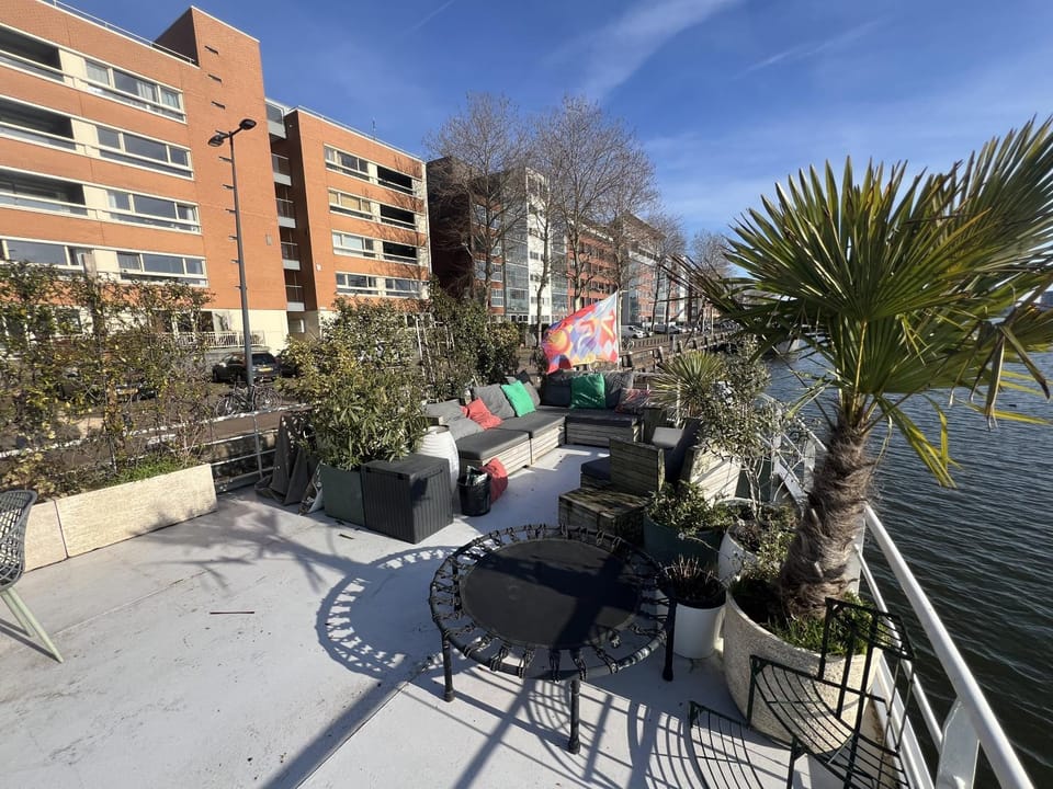 Stunning boat with a view Docked boat in Amsterdam