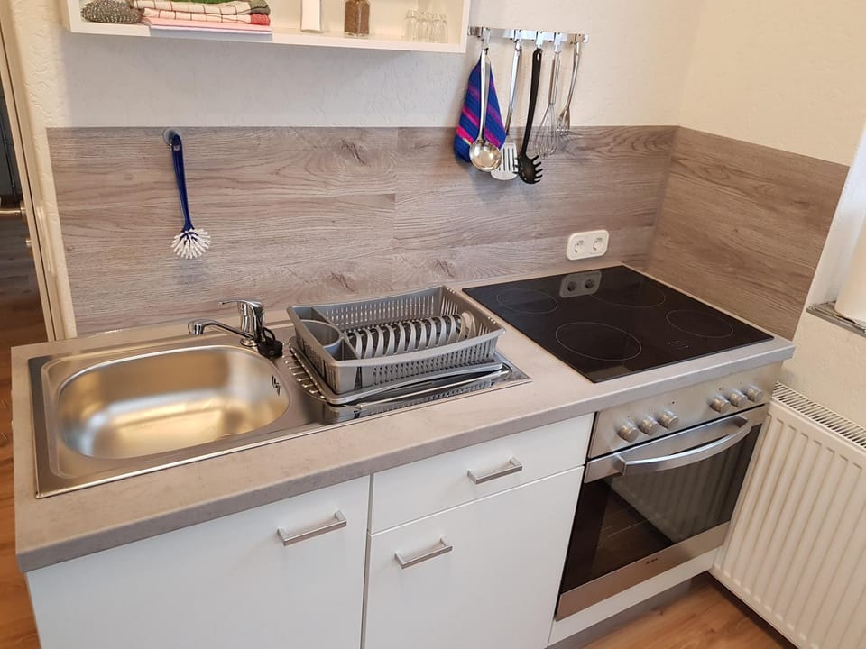 Kitchen or kitchenette, stove