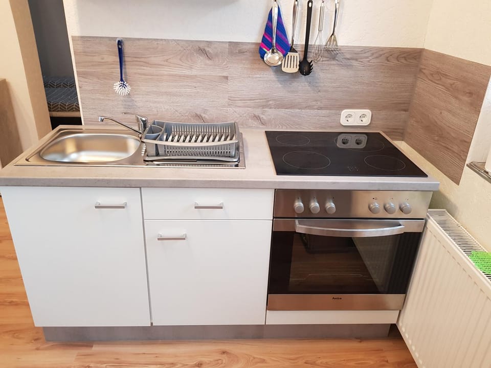 Kitchen or kitchenette, stove
